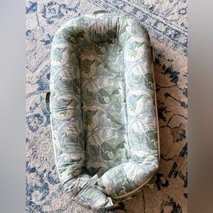 Dock A Tot Deluxe Plus with green leaf acanthus cover